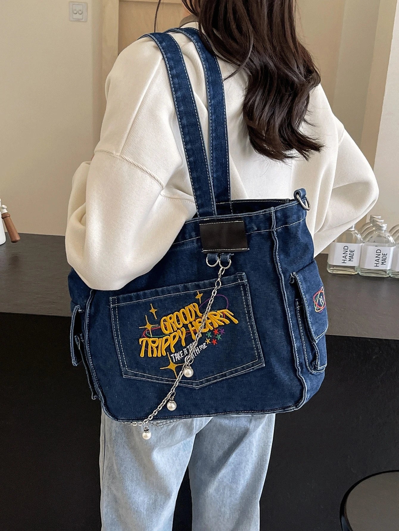 Denim Tote Bag with Hand-Embroidered Floral Design